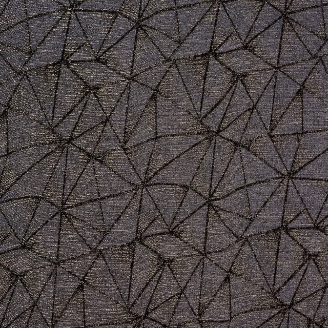 Charcoal geometric woven fabric with angular black lines and subtle texture