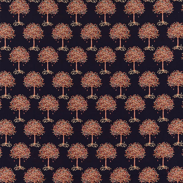 Navy fabric swatch with repeating stylised tree motif in pink and green