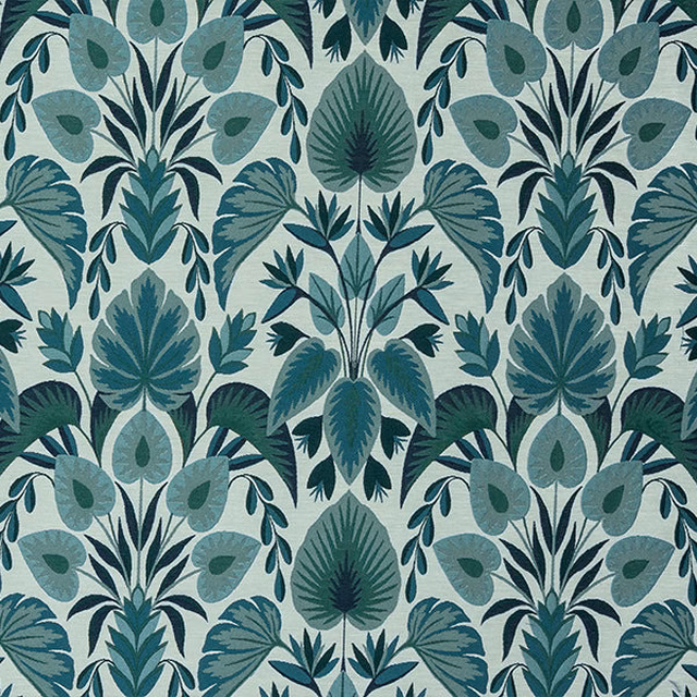 Large-scale teal and aqua botanical fabric on an ivory ground