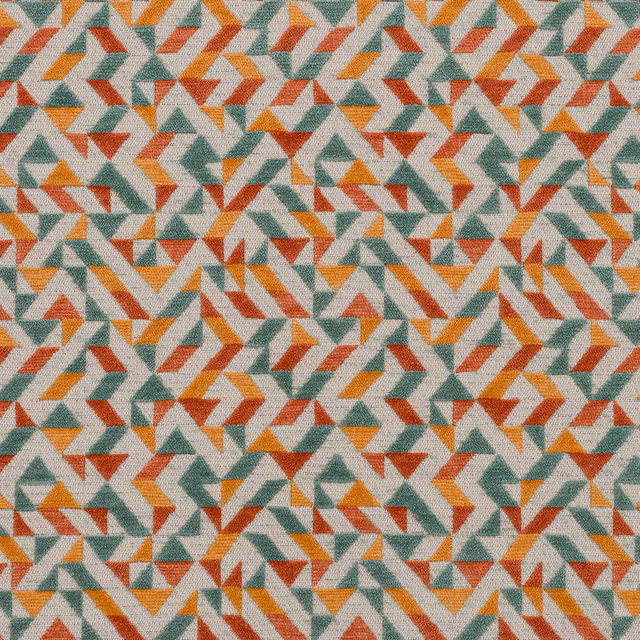 Close-up of a small geometric fabric in citrus orange, sage green and terracotta on a pale ground