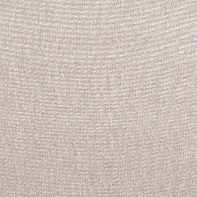 Close-up of soft warm cream woven fabric with a fine matte texture