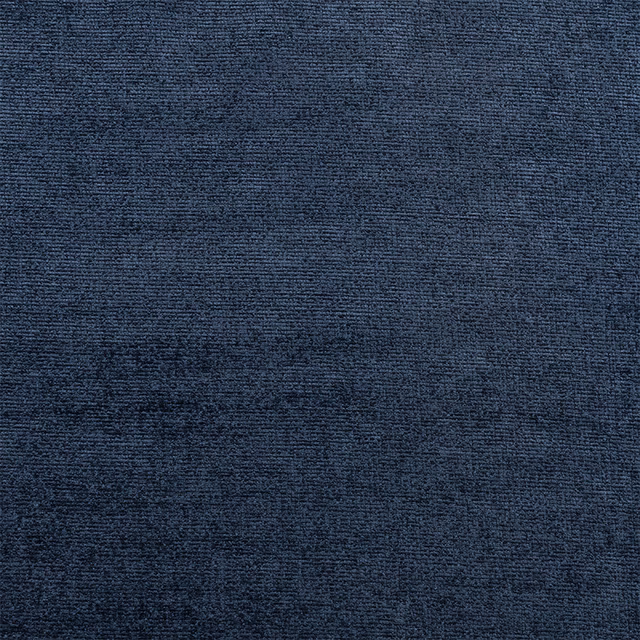 Close-up of a deep indigo blue plain weave fabric with a subtle matte texture