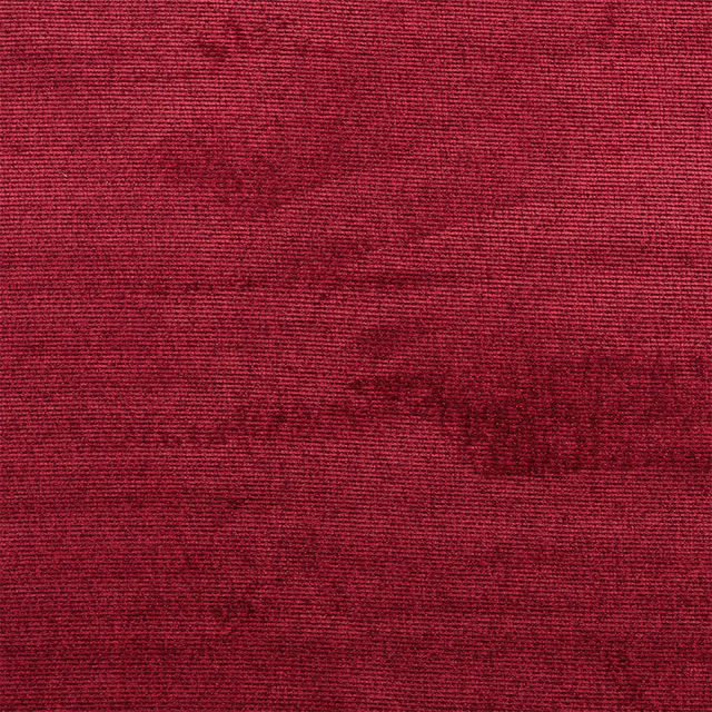 Close-up of rich raspberry-red woven fabric with fine horizontal ribbing