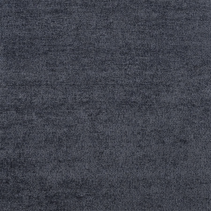 Close-up of a cool slate grey woven fabric with subtle mottled texture