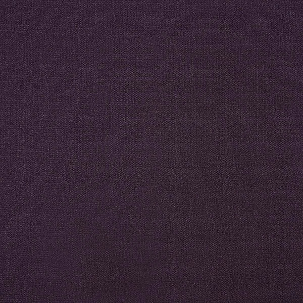 Close-up of deep aubergine purple plain woven fabric with a fine texture