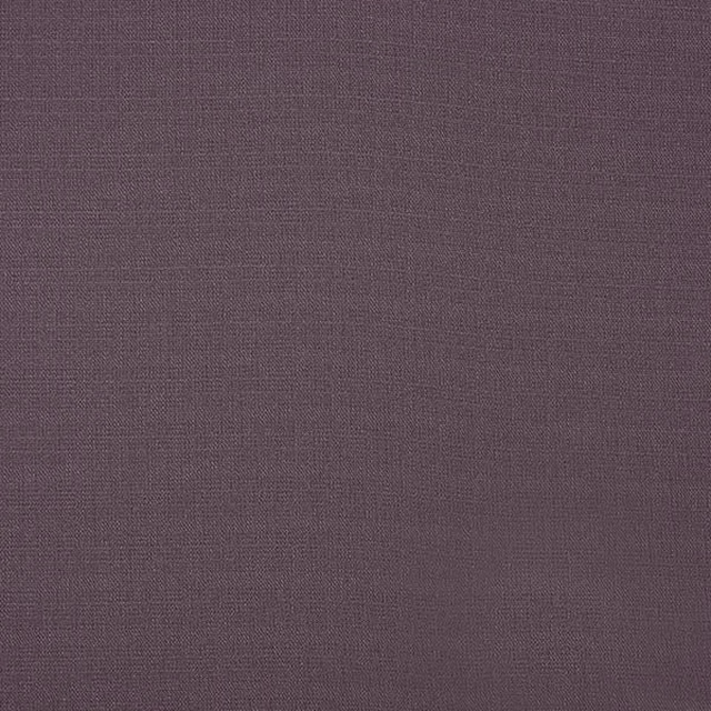 Close-up of muted plum heather plain woven fabric with fine texture