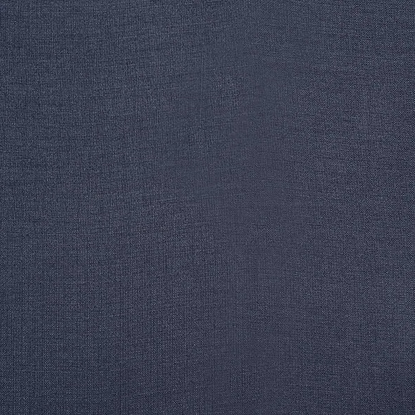 Close-up of deep indigo plain woven fabric with fine textured surface