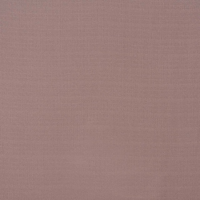 Muted mauve plain woven fabric with a fine, matte texture