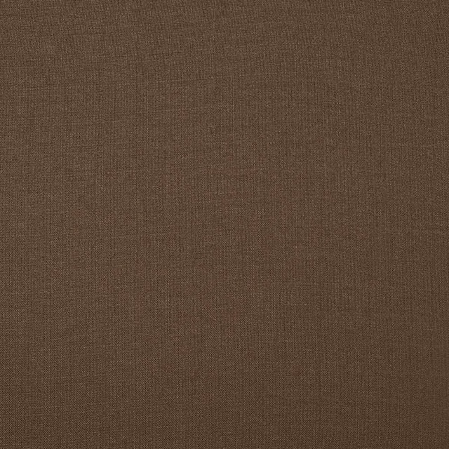 Close-up of a plain warm mocha-brown woven fabric with fine texture