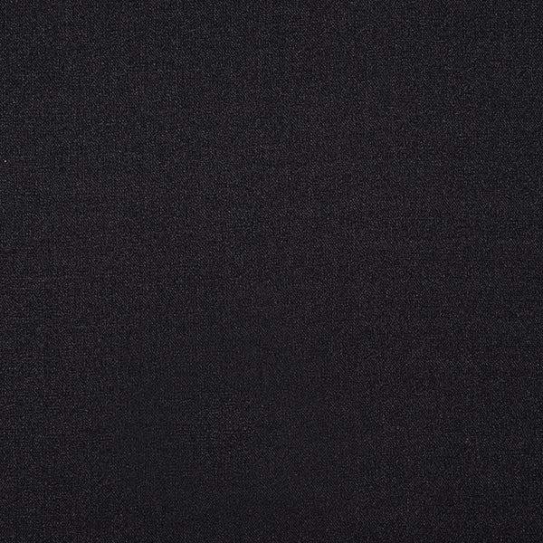 Close-up of deep charcoal black plain woven fabric with a fine texture