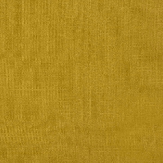 Solid muted ochre-gold woven fabric with fine textured weave