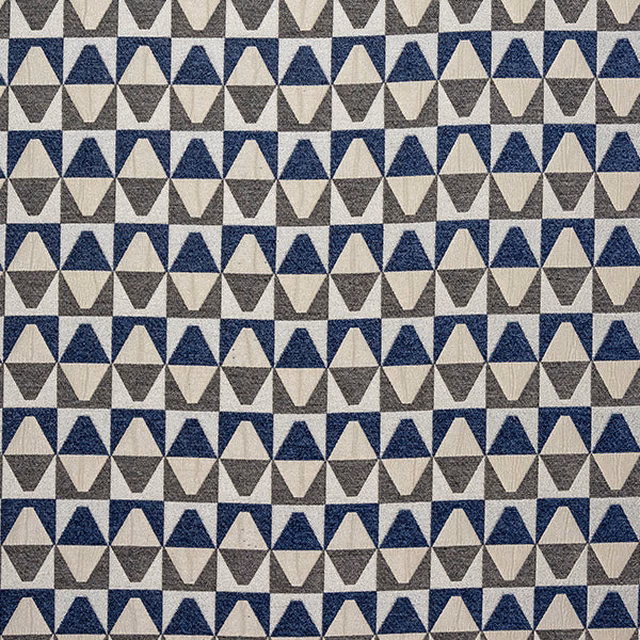 Geometric triangle fabric swatch in indigo, stone and grey woven cotton