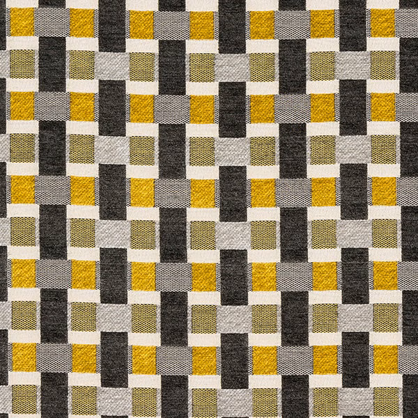 Woven geometric fabric in ochre, charcoal, stone and ivory rectangular blocks