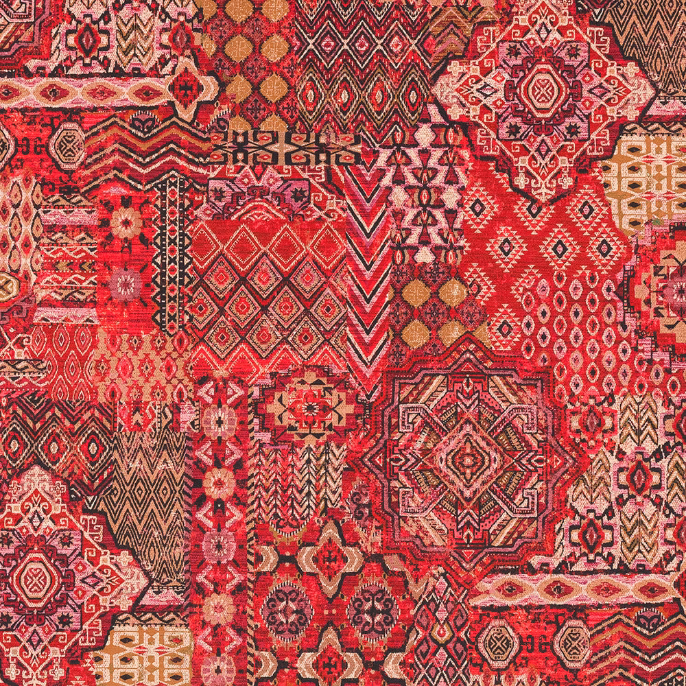 Vibrant crimson Persian patchwork fabric with intricate red, burgundy and gold motifs