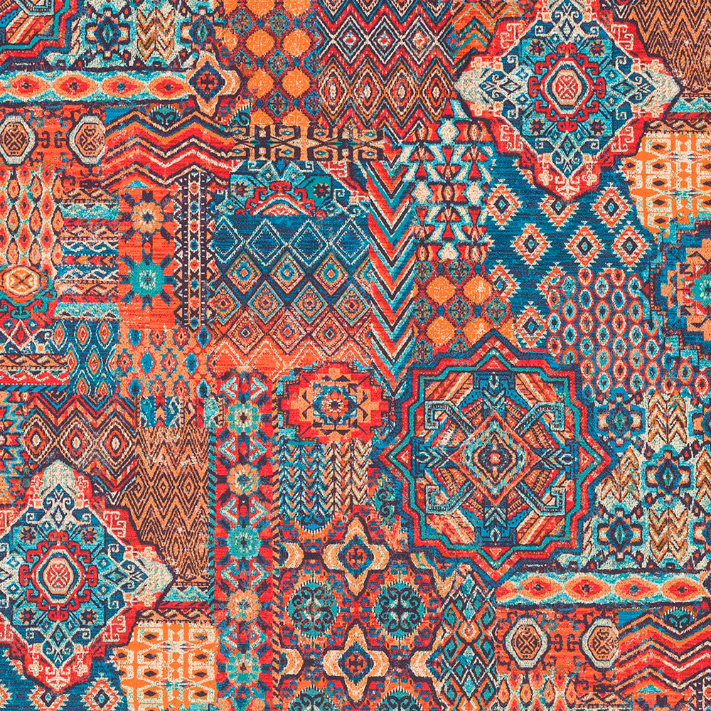 Bold patchwork geometric fabric swatch in teal, coral, rust and cream