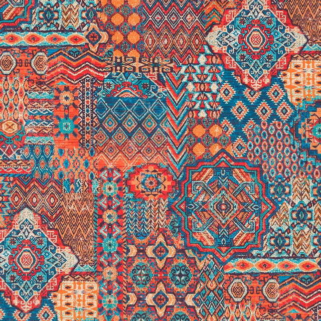Bold patchwork geometric fabric swatch in teal, coral, rust and cream