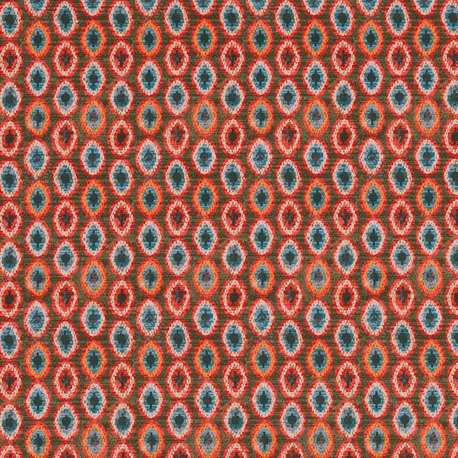 Repetitive oval woven motif in burnt orange, teal, cream and coral