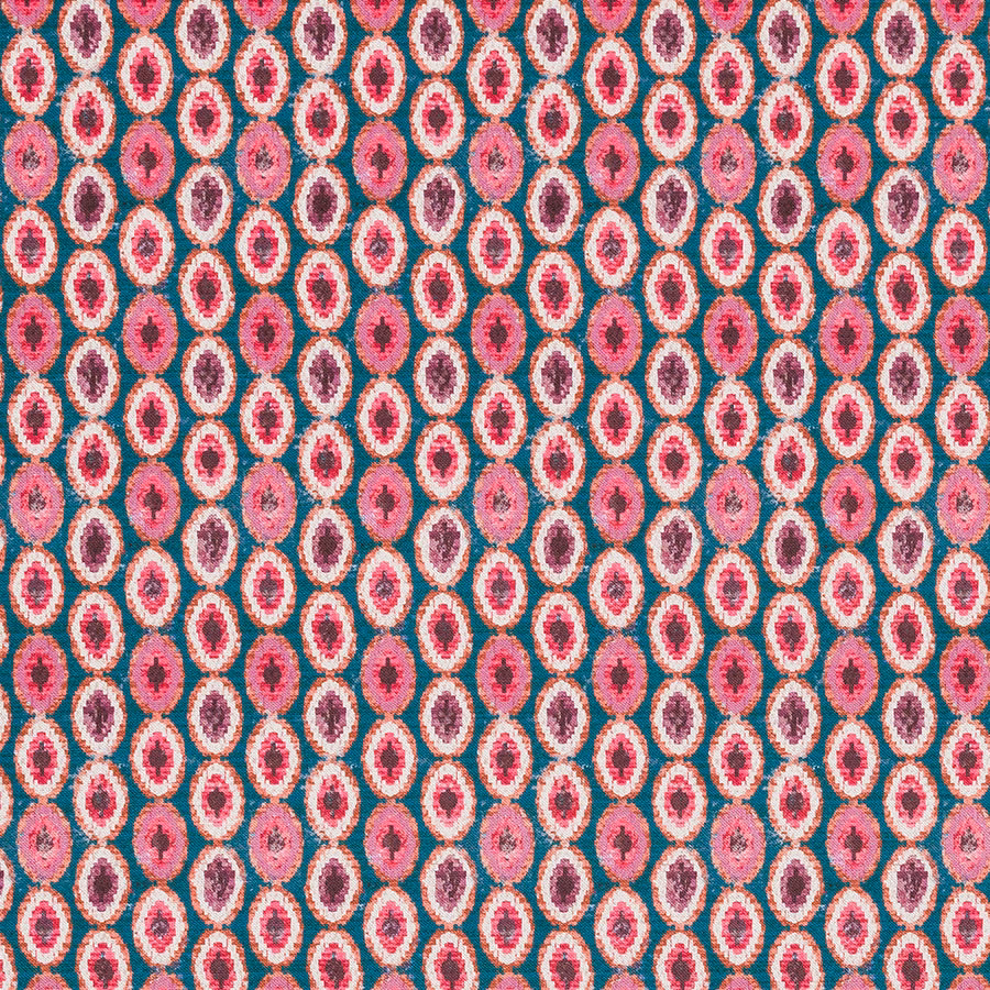 Close-up of small oval geometric fabric in pink, cream, plum and teal