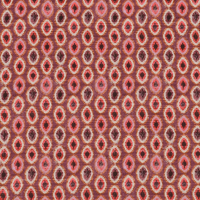 Close-up of Shiraz Rosso woven oval pattern in rose, berry and plum tones