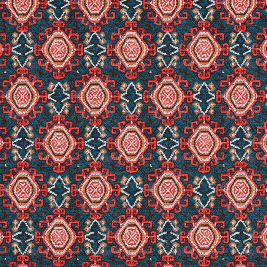 Patterned fabric swatch with burnt orange medallions on a teal ground