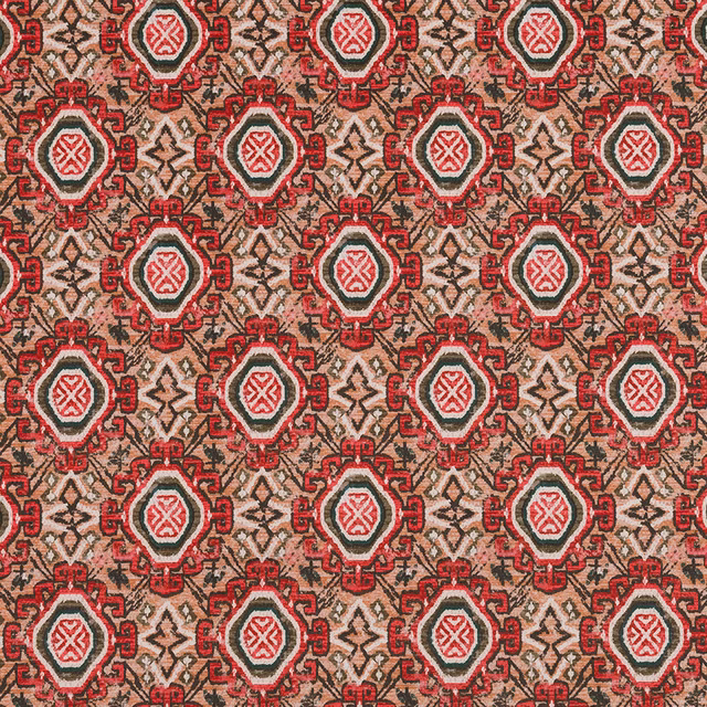 Coral red and sage patterned fabric with repeating medallions on a blush ground