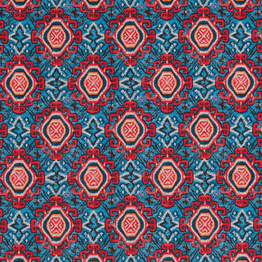 Patterned teal fabric with red and cream geometric medallions