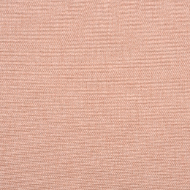 Soft blush pink woven fabric with fine herringbone texture