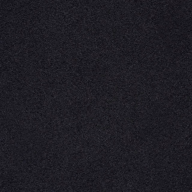 Close-up of a soft charcoal-black boucle plain fabric with fine mottled texture