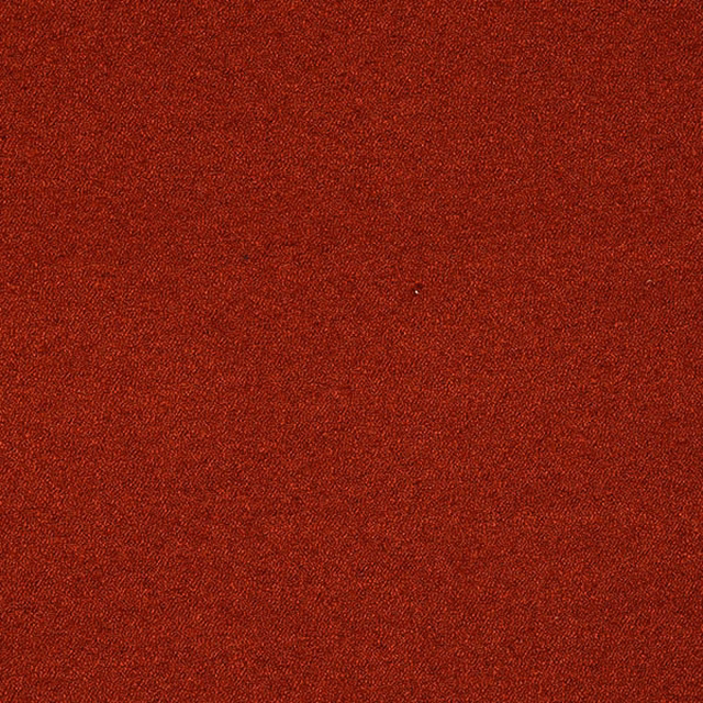 Deep burnt spice red plain woven fabric with a fine textured surface