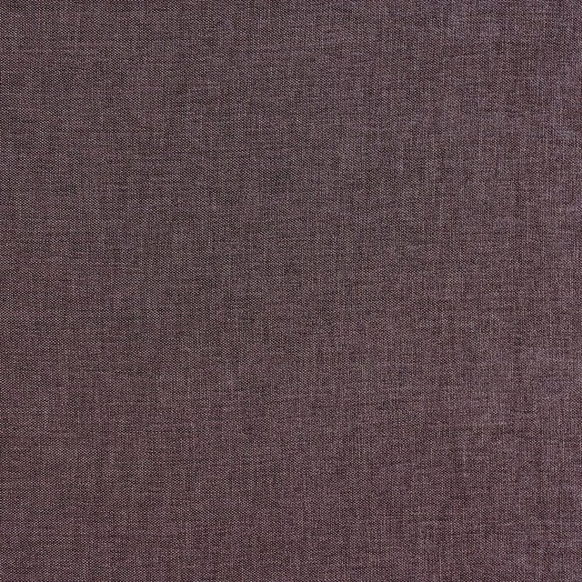 Close-up of a plain woven grape-plum fabric with fine textured weave