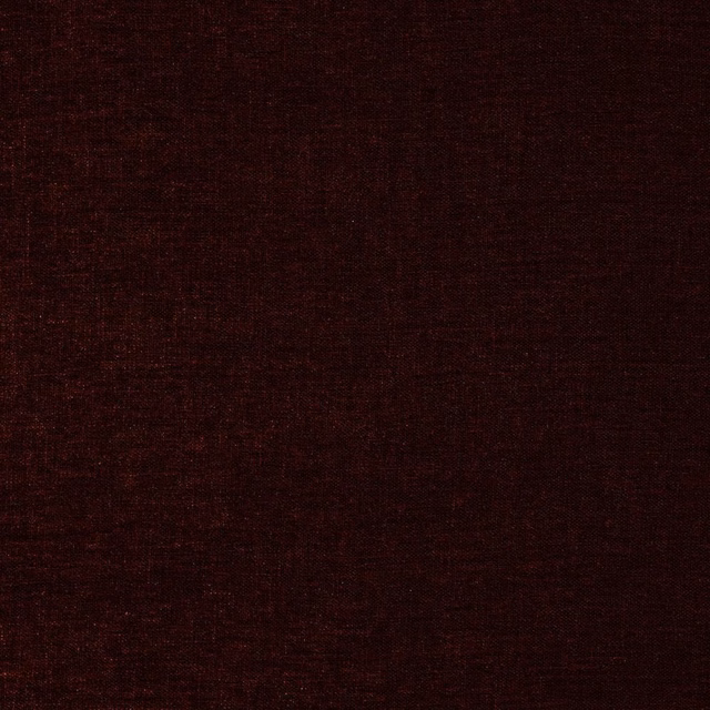 Close-up of deep mulberry plain woven fabric with a fine textured surface
