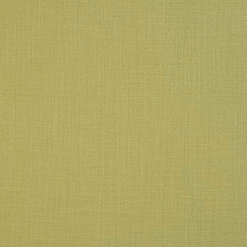 Close-up of fresh apple green plain cotton fabric with fine woven texture