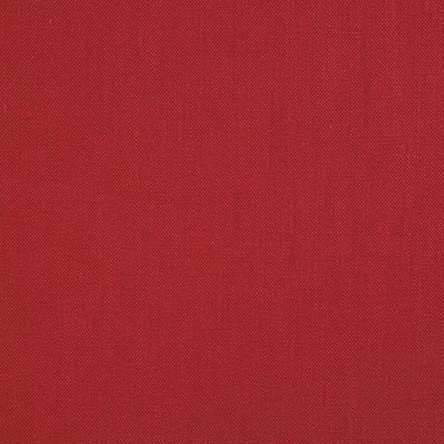 Close-up of a rich chilli red plain woven cotton fabric swatch