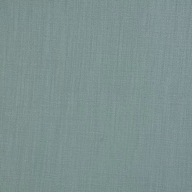 Soft sage green plain woven cotton fabric with a fine, even texture