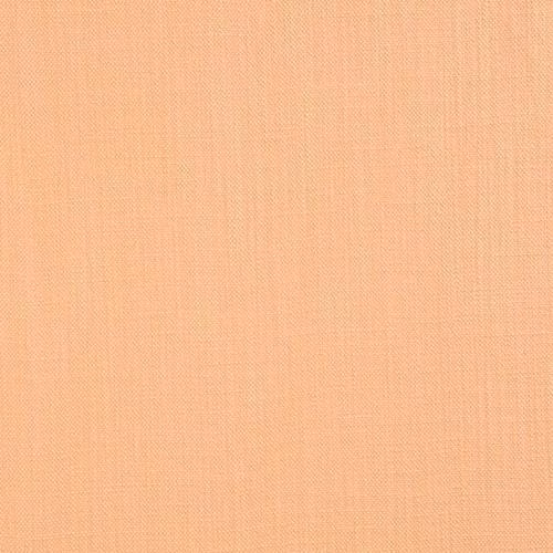 Close-up of a soft sandy gold plain-woven cotton fabric with fine texture