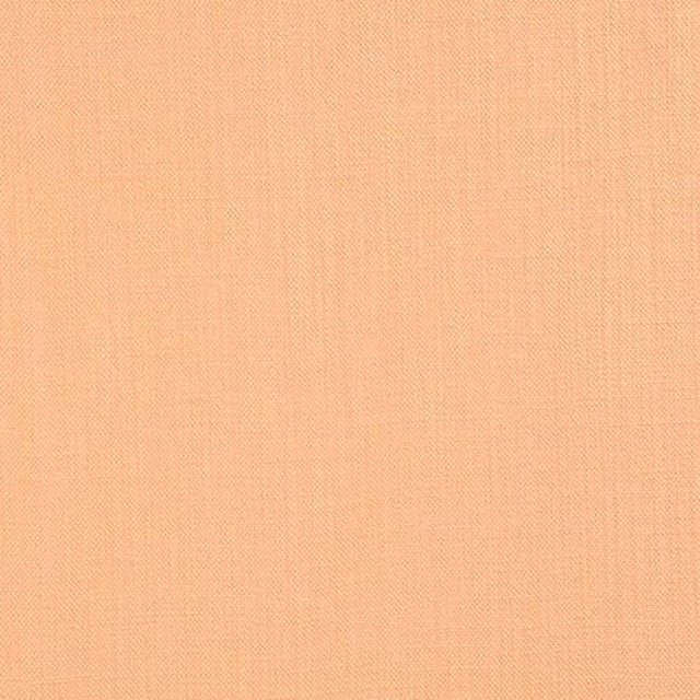 Close-up of a soft sandy gold plain-woven cotton fabric with fine texture