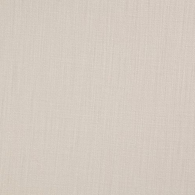 Close-up of soft warm beige plain cotton fabric with fine woven texture