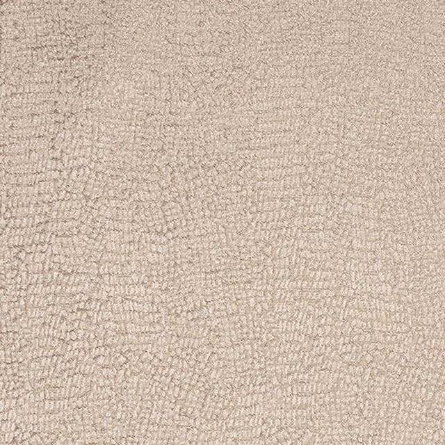 Close-up of softly textured blush beige woven fabric with subtle mottled depth
