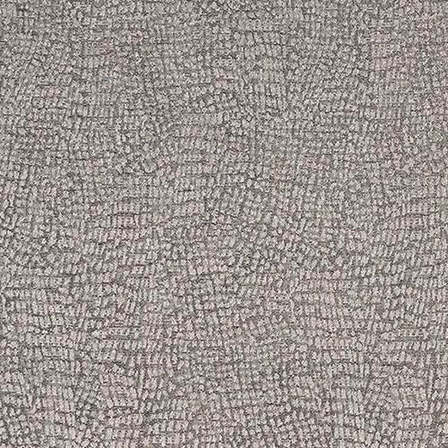 Close-up of Serpa Charcoal fabric showing a small geometric woven texture in warm grey tones.