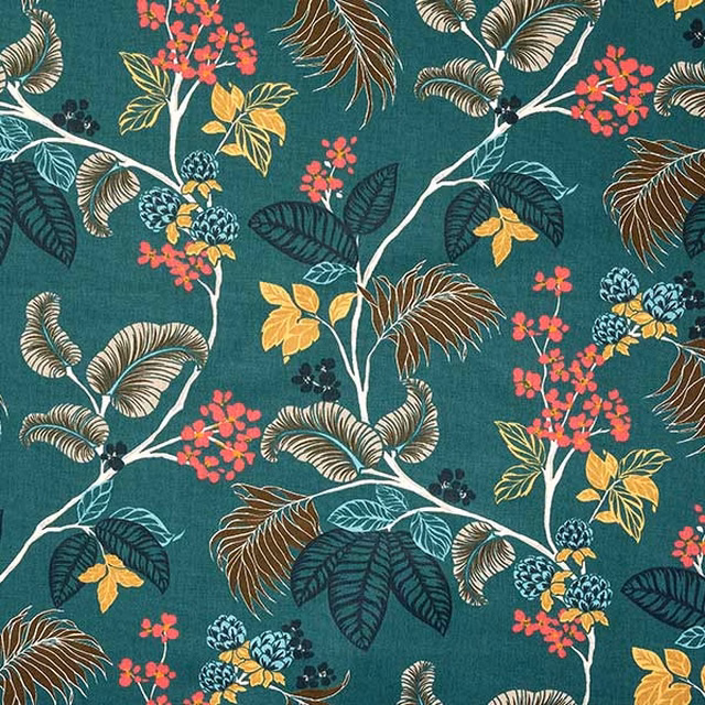 Botanical cotton print on deep jade ground with coral, yellow and teal foliage