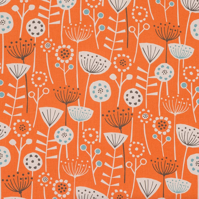 Burnt orange floral PVC fabric with white, grey and teal seedhead motifs