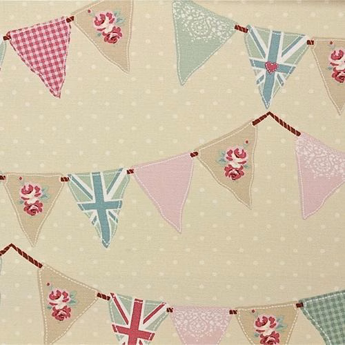 Pale cream PVC fabric with pink and pastel bunting flags and tiny polka dots