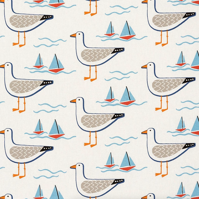 Off-white PVC-coated fabric with gulls, sailboats and blue wave motifs