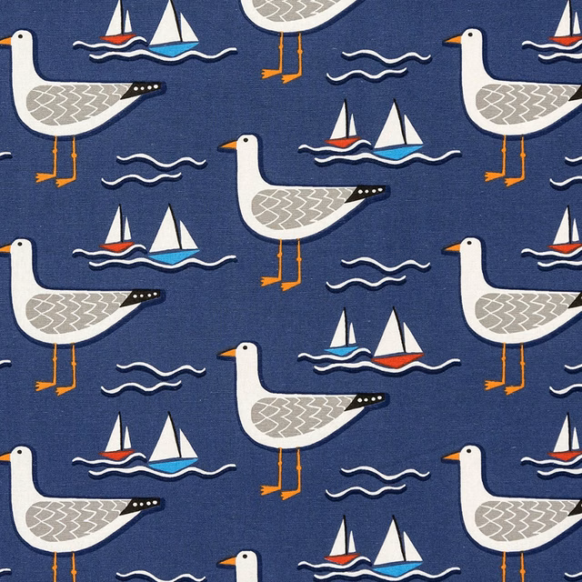 Navy PVC fabric printed with seagulls, sailboats and white waves