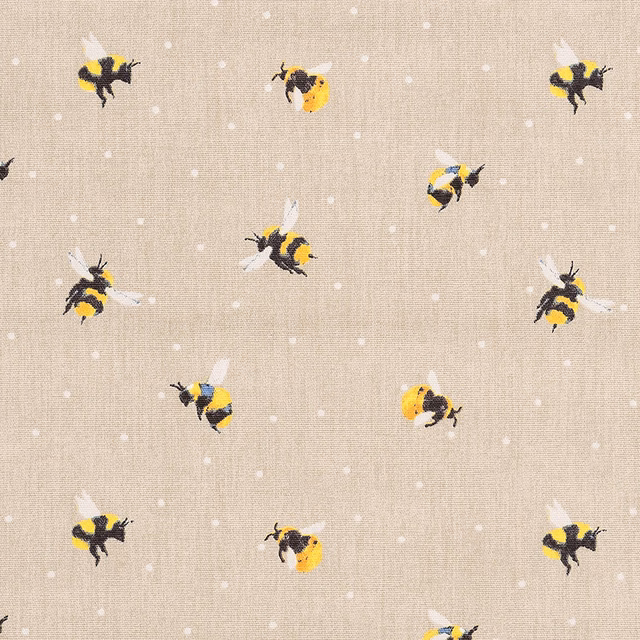 Beige PVC-coated fabric with scattered yellow and black bee motifs