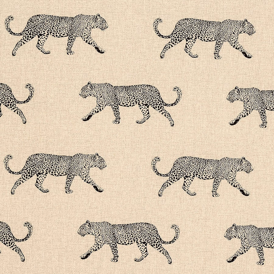 Natural cream wipe-clean fabric with black walking leopard motifs