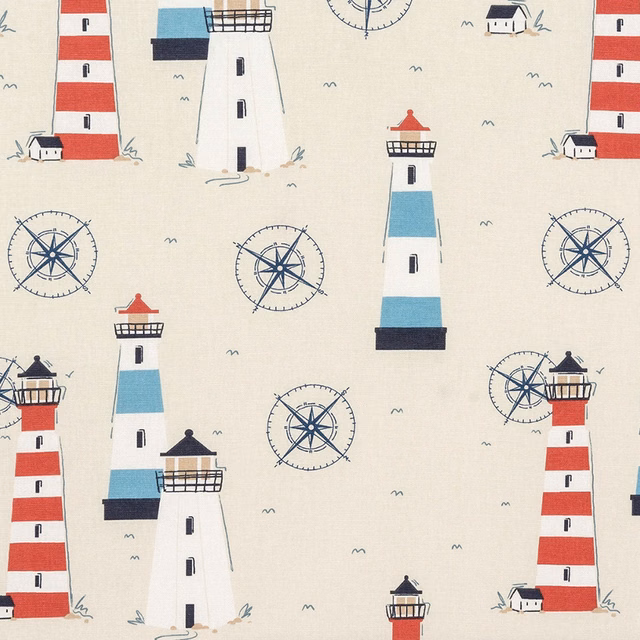 Cream PVC-coated fabric with red and aqua lighthouse print and navy compass motifs