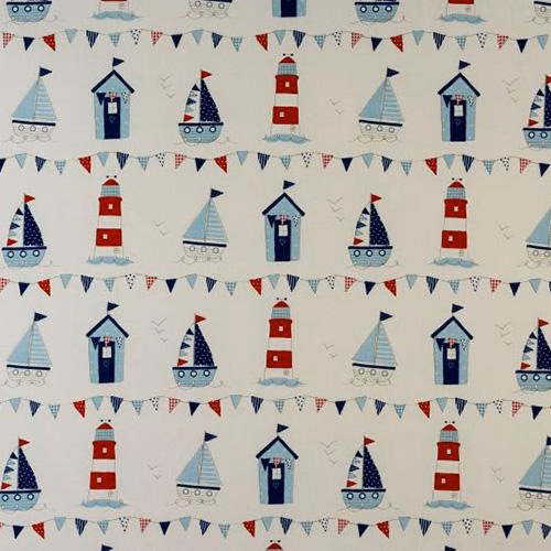 Cream PVC-coated fabric printed with blue sailboats, lighthouses and bunting