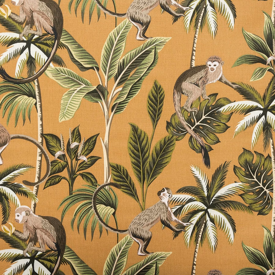 Ochre tropical monkey print on a woven PVC-coated cotton ground