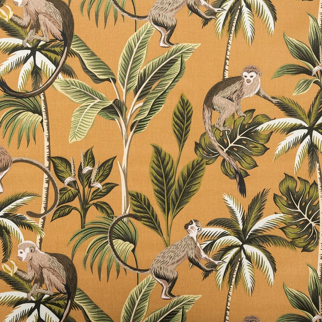 Ochre tropical monkey print on a woven PVC-coated cotton ground
